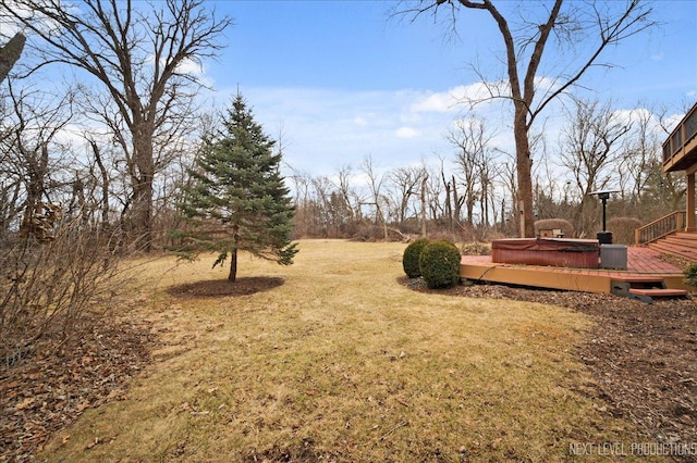 view of yard with a wooden deck