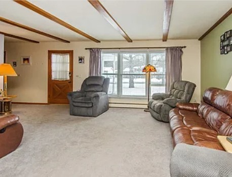 carpeted living room with beam ceiling and a baseboard radiator