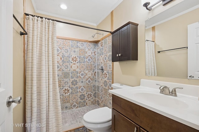 bathroom with vanity, crown molding, toilet, and a shower stall