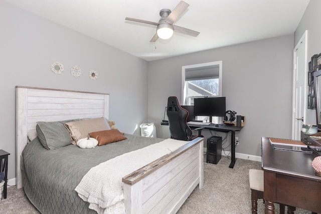 bedroom featuring a ceiling fan, baseboards, and carpet floors