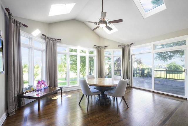 sunroom / solarium with lofted ceiling with skylight and a ceiling fan