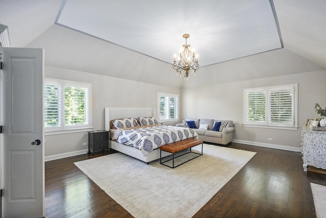 bedroom with vaulted ceiling, multiple windows, and dark wood-style flooring