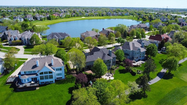 birds eye view of property featuring a residential view and a water view