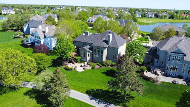 aerial view featuring a residential view and a water view