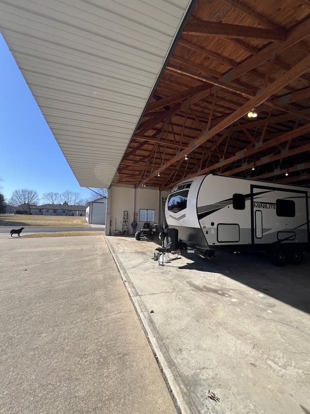 view of parking featuring a carport