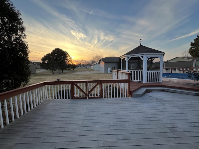 wooden deck with a gazebo