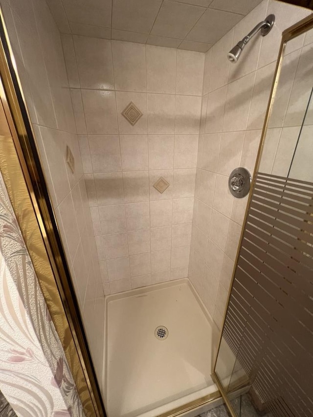 bathroom featuring a stall shower