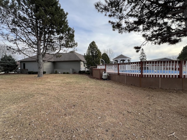 view of yard with an outdoor pool