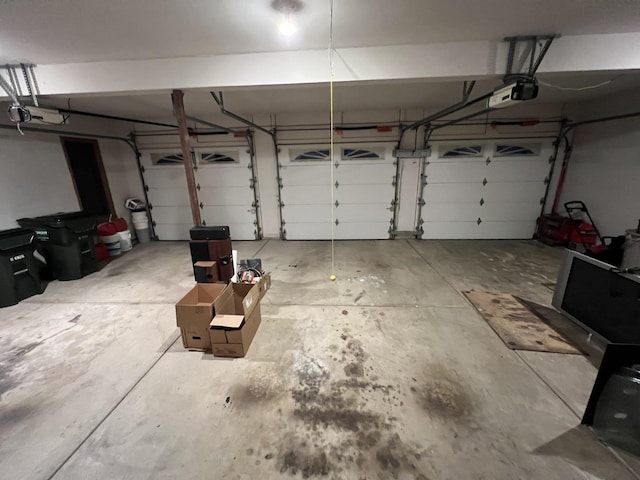 garage featuring a garage door opener