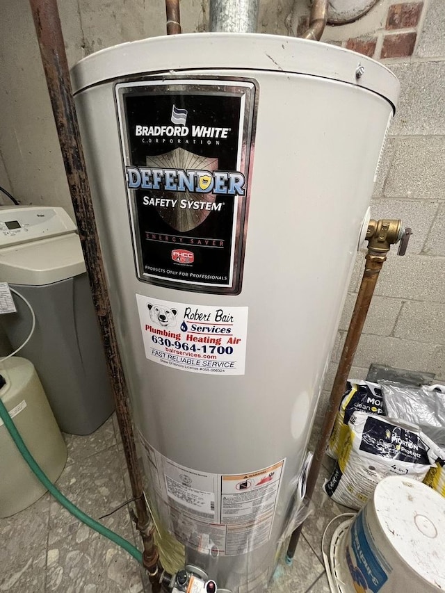 utility room with water heater