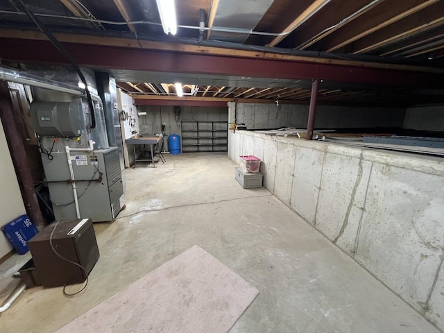 basement featuring heating unit