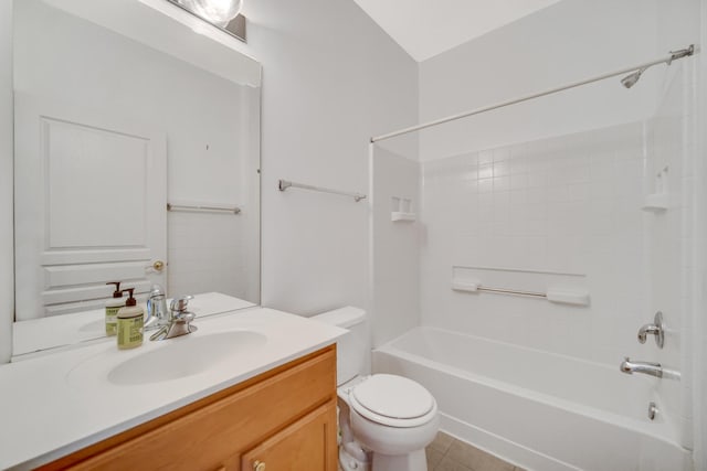 bathroom featuring tub / shower combination, vanity, toilet, and tile patterned floors