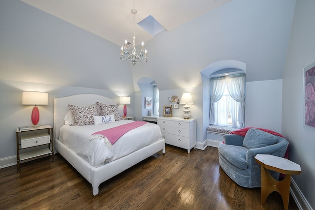 bedroom with dark wood-style floors, a chandelier, baseboards, and lofted ceiling