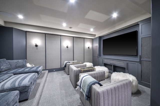 home theater featuring a decorative wall, recessed lighting, and carpet floors