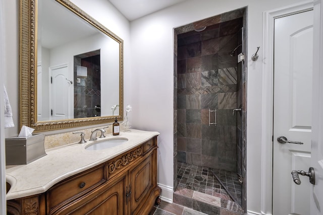 bathroom featuring vanity and a stall shower