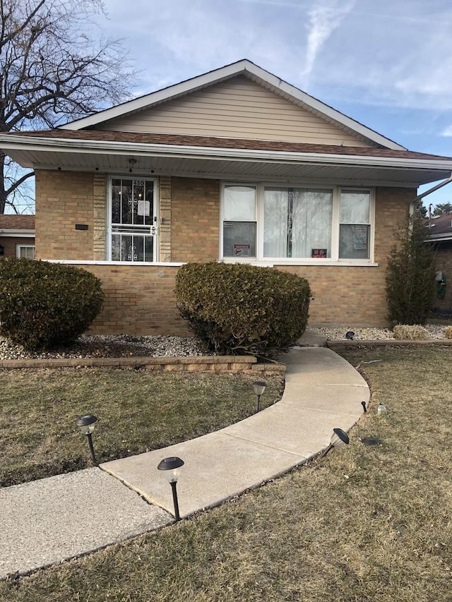 view of front facade with brick siding