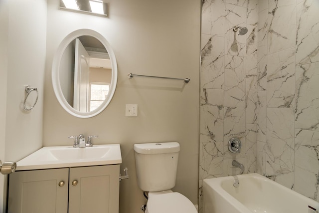 bathroom with toilet, vanity, and shower / tub combination