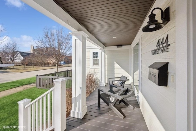 wooden deck with a porch