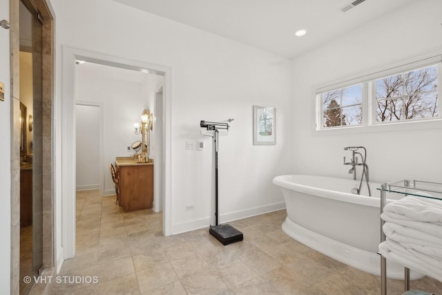 full bathroom featuring baseboards, visible vents, tile patterned floors, a freestanding bath, and recessed lighting