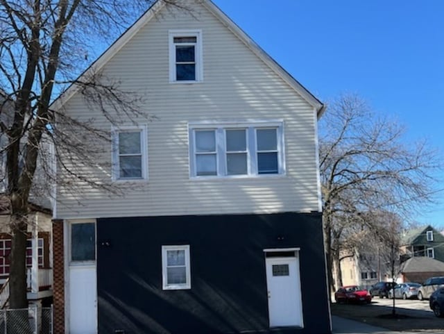 view of side of property with fence