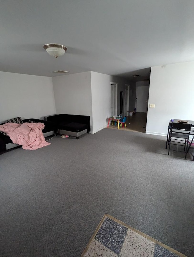 sitting room with carpet flooring