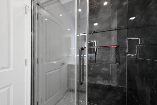 bathroom with a stall shower