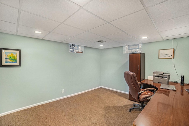 carpeted home office featuring recessed lighting, visible vents, baseboards, and a drop ceiling