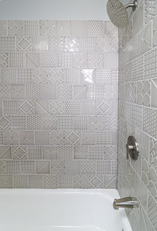 interior space featuring a tile shower