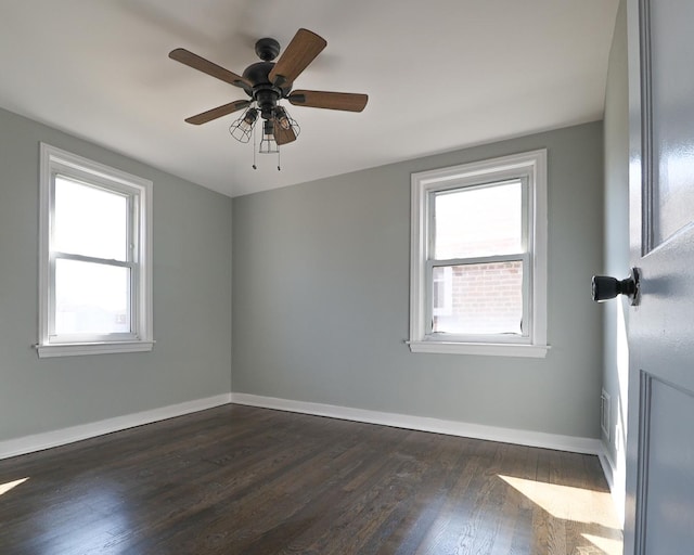 3707 S 59th Ct, Cicero, IL 60804 - unfurnished room featuring a ceiling fan, visible vents, dark wood-style floors, and baseboards
