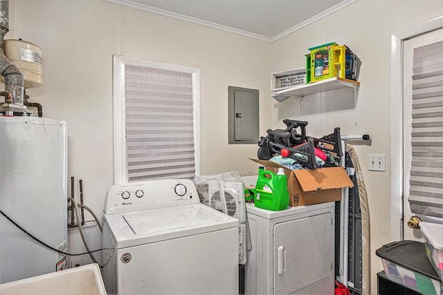 clothes washing area featuring laundry area, electric panel, separate washer and dryer, and ornamental molding