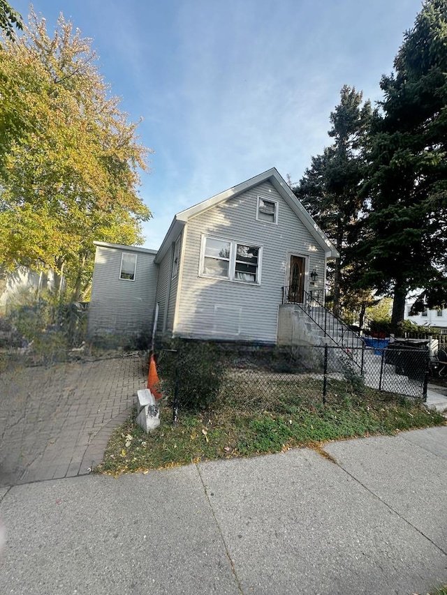 view of front of home with fence