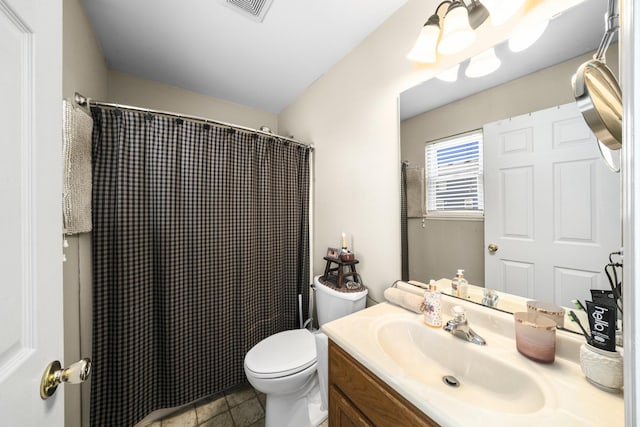 606 Effie Dr, Earlville, IL 60518 - full bathroom featuring vanity, toilet, and a shower with shower curtain
