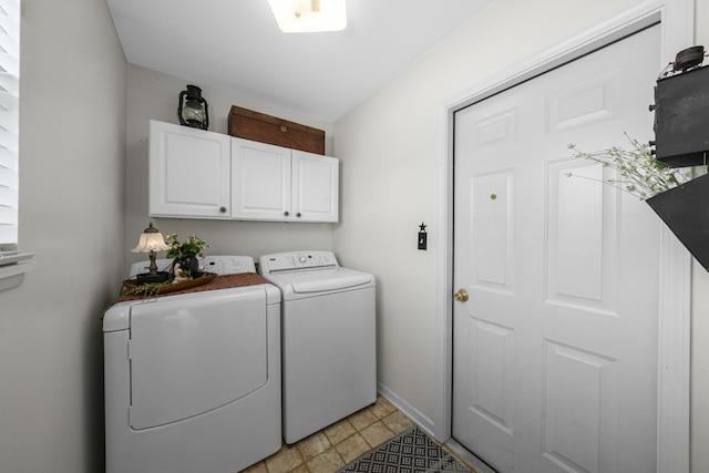 606 Effie Dr, Earlville, IL 60518 - laundry area with washing machine and clothes dryer, cabinet space, and baseboards