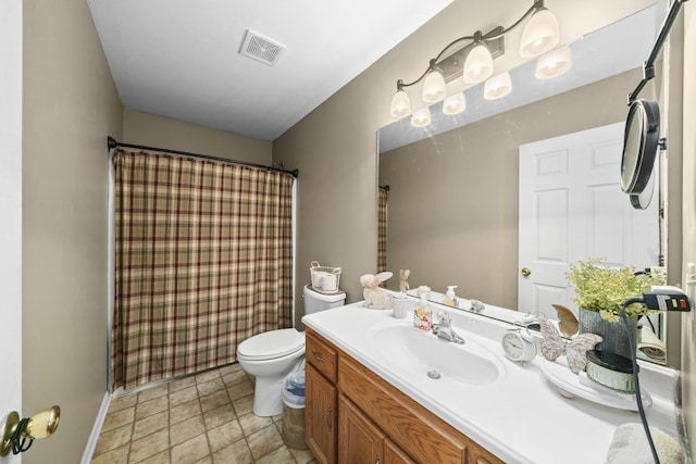 606 Effie Dr, Earlville, IL 60518 - full bathroom featuring vanity, toilet, curtained shower, and baseboards