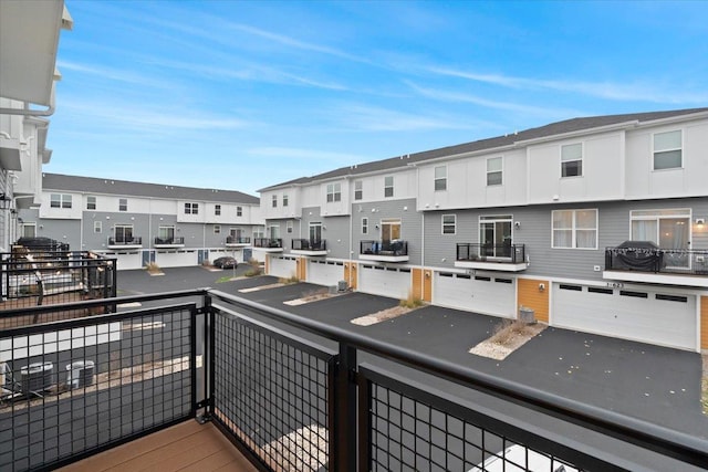 balcony featuring a residential view and area for grilling