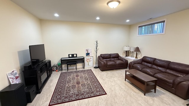 living room with recessed lighting