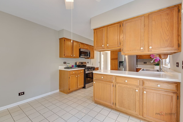 122 Kilchurn Ln, Inverness, IL 60067 - kitchen featuring stainless steel appliances, a sink, light countertops, baseboards, and a peninsula