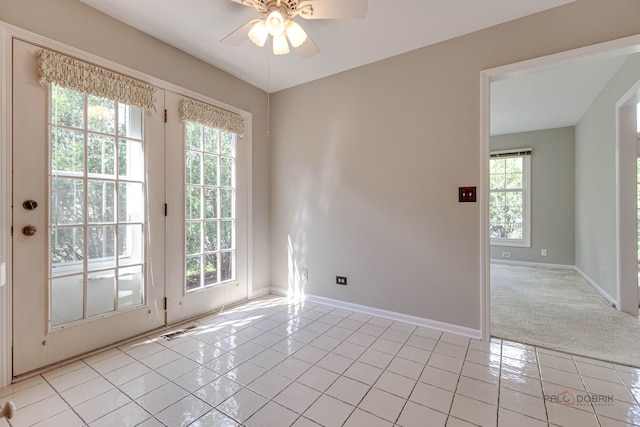 122 Kilchurn Ln, Inverness, IL 60067 - unfurnished room with a ceiling fan, healthy amount of natural light, light tile patterned floors, and baseboards