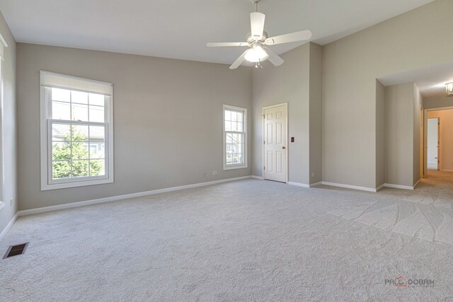 122 Kilchurn Ln, Inverness, IL 60067 - empty room with light colored carpet, baseboards, and ceiling fan