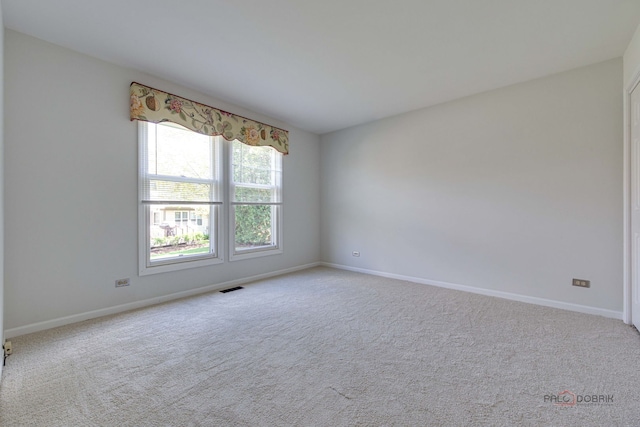 122 Kilchurn Ln, Inverness, IL 60067 - spare room with baseboards and carpet