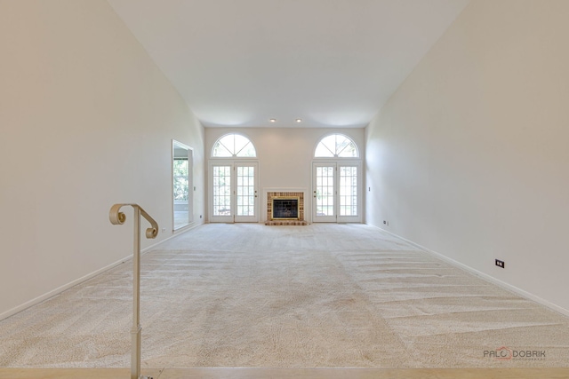 122 Kilchurn Ln, Inverness, IL 60067 - unfurnished living room featuring carpet flooring, baseboards, and a brick fireplace