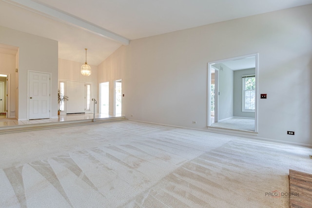 122 Kilchurn Ln, Inverness, IL 60067 - unfurnished living room featuring light colored carpet, a chandelier, and baseboards