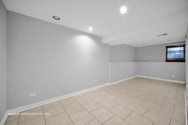 spare room featuring recessed lighting, visible vents, baseboards, and light tile patterned floors