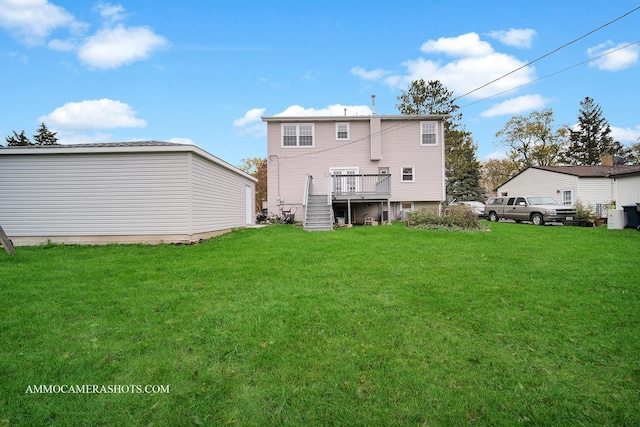 back of house featuring a wooden deck, stairway, and a yard