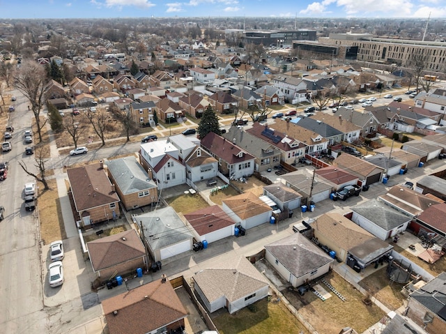 birds eye view of property with a residential view