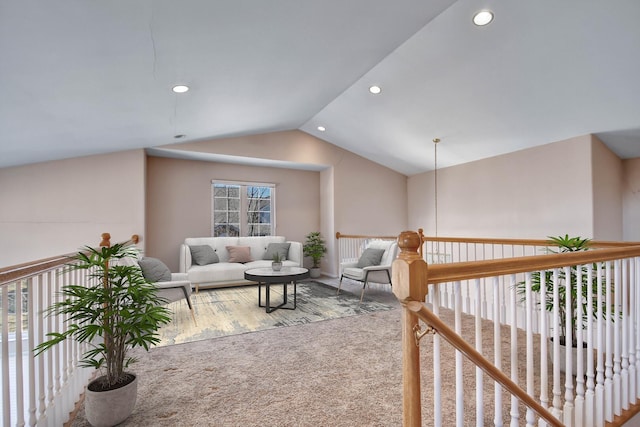 interior space with carpet flooring, recessed lighting, and vaulted ceiling