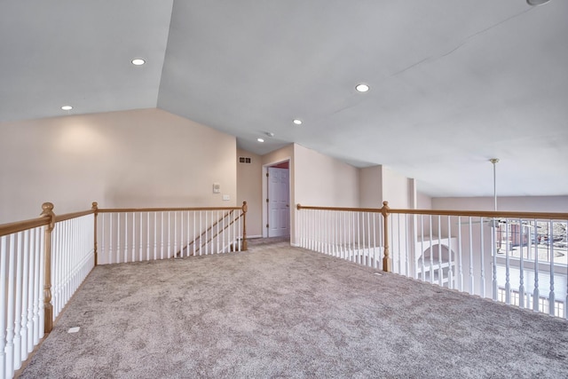 unfurnished room with carpet flooring, recessed lighting, and lofted ceiling