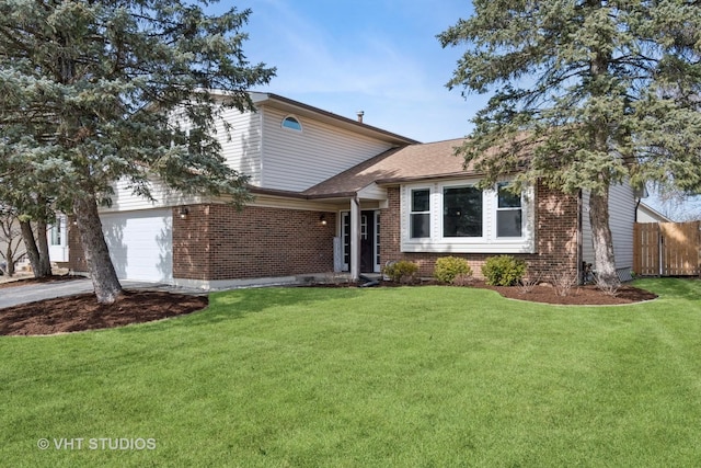 view of front of property with brick siding, a front lawn, and fence