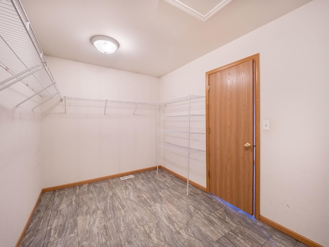 spacious closet with visible vents