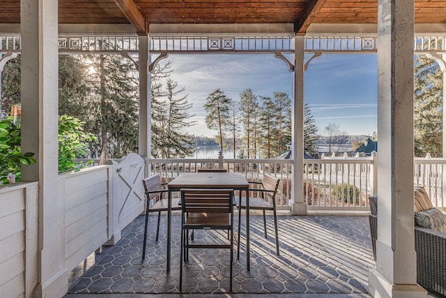 view of patio / terrace with a water view